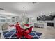 Expansive open-concept living space showcasing elegant dining area, living room, and modern kitchen at 100 Verde Way, Debary, FL 32713