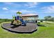 A colorful playground and covered picnic area offer a delightful community space for families at 100 Verde Way, Debary, FL 32713