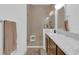 Bathroom features walk-in glass shower and modern vanity with granite countertops at 10120 Sunnifa Aly, Orlando, FL 32832