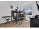 Bedroom with bunk bed, desk, keyboard, dresser, and wood flooring at 10120 Sunnifa Aly, Orlando, FL 32832