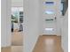 Entryway with tile flooring, modern front door, and sidelight windows at 10120 Sunnifa Aly, Orlando, FL 32832