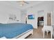 Bright main bedroom features plush carpet, ceiling fan and en-suite walk-in closet at 10120 Sunnifa Aly, Orlando, FL 32832