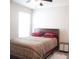 Bedroom with a ceiling fan, window and neutral carpet at 14146 Jomatt Loop, Winter Garden, FL 34787