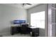 Bright office space featuring a large window and modern workstation setup at 14146 Jomatt Loop, Winter Garden, FL 34787
