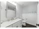 Clean bathroom features a modern vanity with quartz countertop and stylish fixtures at 16262 Firedragon Dr, Winter Garden, FL 34787