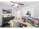Bright office features a ceiling fan, natural light, and dual monitors for productivity at 16262 Firedragon Dr, Winter Garden, FL 34787