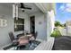 Cozy outdoor patio with dining set and overhead fan, perfect for relaxing at 16262 Firedragon Dr, Winter Garden, FL 34787