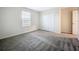 Bedroom offering a window for natural light and double door closet at 16436 Fernridge St, Clermont, FL 34714