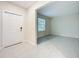 Bright entryway with tile flooring and a view into the living area at 16436 Fernridge St, Clermont, FL 34714