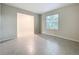 Versatile flex room with a window and tile flooring is an ideal den or office space at 16436 Fernridge St, Clermont, FL 34714