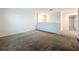 Upstairs loft features neutral walls and carpeted floors, creating a versatile living space at 16436 Fernridge St, Clermont, FL 34714