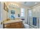 Well-maintained bathroom with a shower, toilet, and sink at 214 Paloma Dr, Davenport, FL 33837