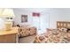 Comfortable bedroom with twin beds and closet at 214 Paloma Dr, Davenport, FL 33837
