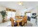 Bright dining area with a large window and comfortable seating at 214 Paloma Dr, Davenport, FL 33837