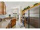Well-equipped kitchen with stainless steel appliances and ample counter space at 214 Paloma Dr, Davenport, FL 33837