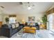 Comfortable living room with two sofas and tile floors at 214 Paloma Dr, Davenport, FL 33837