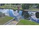 Aerial view of the boat ramp and canal with waterfront community homes at 2430 Westwood Dr, Longwood, FL 32779