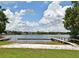 Beautiful lake view with a sandy beach area and multiple docks at 2430 Westwood Dr, Longwood, FL 32779