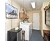 Efficient laundry room equipped with washer, dryer, storage cabinets and mini fridge at 2430 Westwood Dr, Longwood, FL 32779