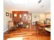 Open-concept space features hardwood floors and neutral tones, providing a versatile area for relaxation and entertainment at 2430 Westwood Dr, Longwood, FL 32779