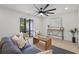 Comfortable living room featuring a cozy seating arrangement, modern decor, and ample natural light at 2932 Carriage Dr, South Daytona, FL 32119