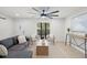 Bright living room with stylish furnishings, large windows, and neutral decor, creating a welcoming space at 2932 Carriage Dr, South Daytona, FL 32119