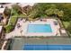 Enjoy community living with an aerial view of the pool and tennis courts, ideal for recreation and relaxation in the neighborhood at 5365 Elm Ct # 331, Orlando, FL 32811