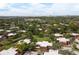 An aerial view of the community with lush green trees, manicured lawns and beautiful landscaping at 5365 Elm Ct # 331, Orlando, FL 32811