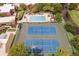 This aerial showcases the community tennis courts and pool, promising a recreational lifestyle within a vibrant neighborhood at 5365 Elm Ct # 331, Orlando, FL 32811