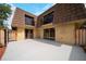 Modern two-story townhouse with a neutral color scheme and a fenced-in patio at 5365 Elm Ct # 331, Orlando, FL 32811