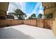 Private outdoor patio with wood fence, perfect for relaxing or entertaining guests at 5365 Elm Ct # 331, Orlando, FL 32811