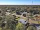 Charming single-story home featuring a well-manicured lawn and nestled in a serene, wooded neighborhood at 611 S Montgomery Ave, Deland, FL 32720