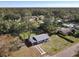 Charming single-story home featuring a well-manicured lawn and nestled in a serene, wooded neighborhood at 611 S Montgomery Ave, Deland, FL 32720