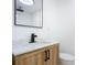Bathroom sink featuring modern matte black fixtures and a marble countertop at 611 S Montgomery Ave, Deland, FL 32720