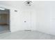 Bright, tiled room featuring a modern ceiling fan and a freshly painted white door at 611 S Montgomery Ave, Deland, FL 32720