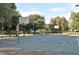 Outdoor basketball court surrounded by trees, providing a shaded recreational area at 643 Cricklewood Ter, Lake Mary, FL 32746