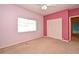 Bedroom features a window, closet, and carpet for a comfortable space at 643 Cricklewood Ter, Lake Mary, FL 32746