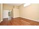 Bright bedroom with hardwood flooring, light-colored walls, and neutral finishes at 643 Cricklewood Ter, Lake Mary, FL 32746