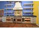 Gourmet kitchen with a professional-grade range, custom hood, and ample storage at 643 Cricklewood Ter, Lake Mary, FL 32746