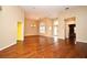 Expansive living room featuring hardwood floors, neutral walls, and plenty of natural light at 643 Cricklewood Ter, Lake Mary, FL 32746