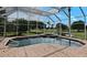 Relaxing screened pool area overlooking the manicured golf course and tranquil pond views at 643 Cricklewood Ter, Lake Mary, FL 32746