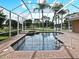 Relaxing screened pool area overlooking the manicured golf course and tranquil pond views at 643 Cricklewood Ter, Lake Mary, FL 32746