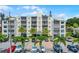 Beautiful condominium building with manicured landscaping and ample parking in a desirable location at 1100 Delaney Ave # F407, Orlando, FL 32806
