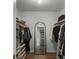 Well-organized walk-in closet with shelving and hanging space for optimal storage at 1100 Delaney Ave # F407, Orlando, FL 32806
