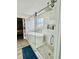 Chic bathroom with a luxurious free-standing tub and glass-enclosed shower at 115 Willowbay Ridge St, Sanford, FL 32771