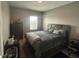 Comfortable bedroom with a large bed, neutral colors, and a relaxing atmosphere at 1166 Heron Sound Dr, Apopka, FL 32703