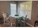 Cozy breakfast nook with natural light and comfortable seating at 1166 Heron Sound Dr, Apopka, FL 32703