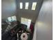 An expansive, elevated view of the living room and breakfast nook at 1166 Heron Sound Dr, Apopka, FL 32703