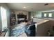 Spacious loft area with stylish decor, comfortable seating, and ample natural light at 1166 Heron Sound Dr, Apopka, FL 32703