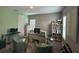 Bright home office with a large desk, comfortable seating, and plenty of storage space at 1166 Heron Sound Dr, Apopka, FL 32703